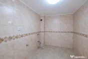 Casă din cărămidă, cu garaj și curte proprie – zona c 