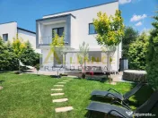 Mobilata si utilata-Panouri solare-4 camere-curte amenajată 