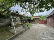 Casă de vânzare în satul Dârlos – teren 1.026 mp