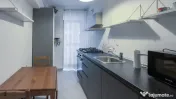 Descoperiți confortul vieții moderne într-un apartament perf 