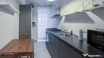 Descoperiți confortul vieții moderne într-un apartament perf