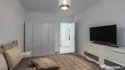 Descoperiți confortul vieții moderne într-un apartament perf 