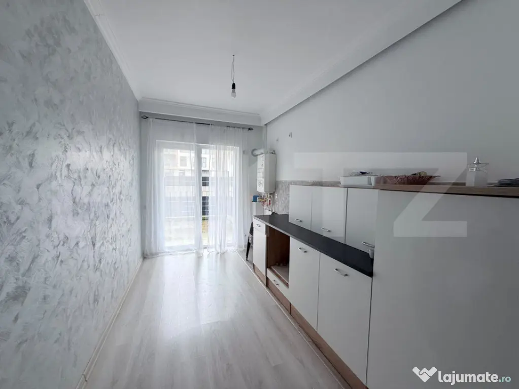 Apartament 3 camere, 56 mp, gradina 34 mp, parcare, zona Cet - Floresti (Cluj)