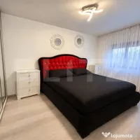 Apartament cu 3 camere, curte proprie și parcare 