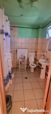 Apartament cu 3 camere+ spațiu comercial