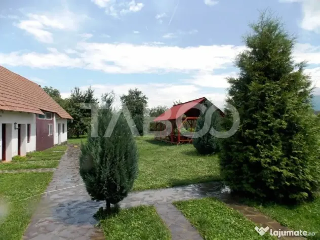 Pensiune 13 camere si teren 3000 mp de vanzare la cheie Comi - Cartisoara (Sibiu)