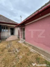Casă de vânzare cu curte, grădină și beci 