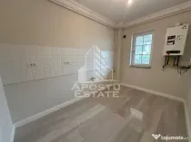 Apartament cu 2 camere si curte bucatarie separata in Giroc la asfalt
