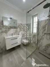 Apartament cu 2 camere si curte bucatarie separata in Giroc la asfalt