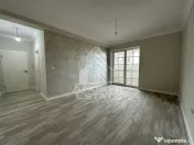 Apartament cu 2 camere si curte bucatarie separata in Giroc la asfalt