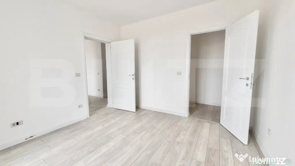 Apartament decomandat cu 2 camere + balcon,1 loc de parcare, - Giroc (Timis)
