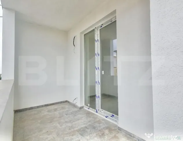 Apartament decomandat cu 2 camere + balcon,1 loc de parcare, - Giroc (Timis)