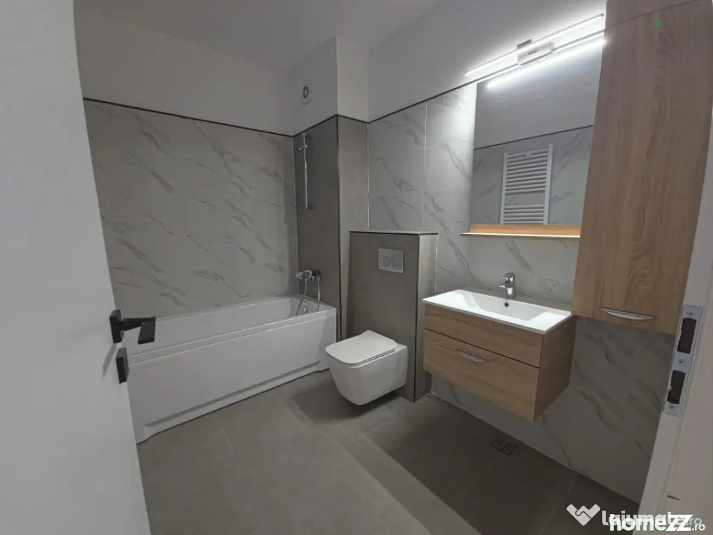 Dacia apartament 3 camere nou incalzire pardoseala loc parca