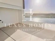 Apartament cu vedere la lac, terasă, piscină, situat într-o stațiune de golf 