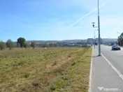 Teren intravilan de vânzare 7.002 mp Mioveni Deschidere 70 m la bld. 