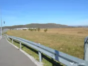 Teren intravilan de vânzare 7.002 mp Mioveni Deschidere 70 m la bld. 