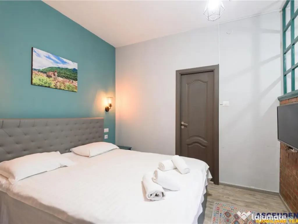 Apartament extins, trei unitati locative cu baie proprie, ce