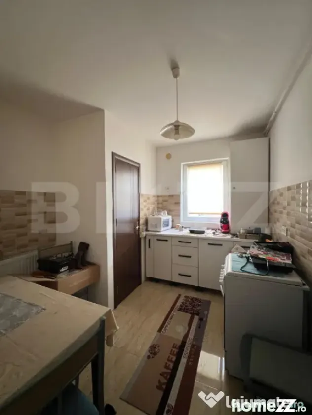 Apartament cu 2 camere, 56 mp, cu grădină, loc de parcare,