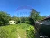Băicoi | Teren 1000 mp + clădire din zidărie, cu utili...