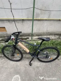 Bicicletă de oraș și munte-scapă de trafic și cheltuială