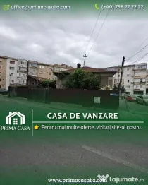 Proprietate cu potențial comercial – casă și teren în zona centrala