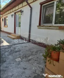 Casa batraneasca cu teren de 435mp cu utilitati si deschider