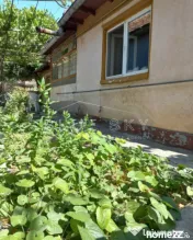 Casa batraneasca cu teren de 435mp cu utilitati si deschider 