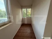 Casă cu 4 camere și un teren de 1000 mp 