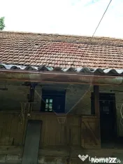 Casă batraneasca Laz comuna Dezna,teren 2800 mp teren 