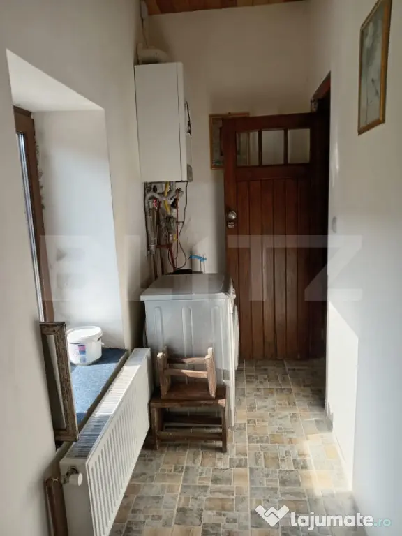 Casă complet renovată, 3 camere, teren 3800 mp – comuna