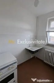 Garsoniera Craiovei etaj intermediar in bloc de apartamente 