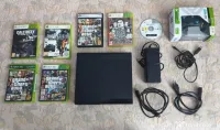 Consolă Xbox 360 E + Manetă și 6 jocuri (GTA V, GTA IV, Forza Horizon etc.)