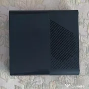 Consolă Xbox 360 E + Manetă și 6 jocuri (GTA V, GTA IV, Forza Horizon etc.) 