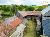 Casa din caramida cu 1.087 mp teren, pozitie centrala, utili