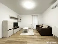 Apartament intr-un bloc retras, cu centrala si parcare