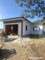 Casă spațioasă cu garaj și teren 700 mp – la roșu sau