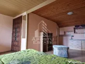 Casa familiala cu spatiu comercial si garaj P+1E+M 720 Mp 