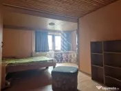 Casa familiala cu spatiu comercial si garaj P+1E+M 720 Mp 