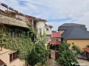Casa familiala cu spatiu comercial si garaj P+1E+M 720 Mp 