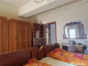 Casa familiala cu spatiu comercial si garaj P+1E+M 720 Mp 