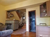 Casa familiala cu spatiu comercial si garaj P+1E+M 720 Mp 
