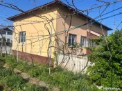 Casă din cărămidă cu beci și teren generos de 2.320 mp