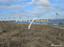 Teren 965mp.deschidere la 3 strazi, pe malul Lacului Techirg