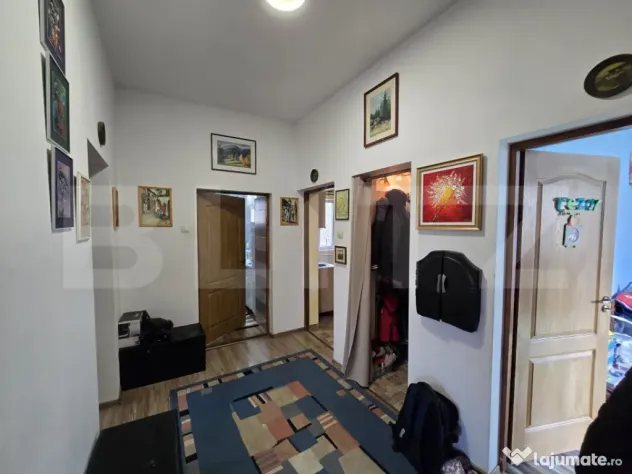 Apartament in casa 100 mp, 3 camere, teren 260mp, zona Dambu