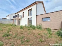 Casa cuplata prin garaj 23 mp, sup.totala 147 mp,teren 400 mp Chinteni