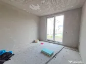 Casa cuplata prin garaj 23 mp, sup. totala 147 mp P+E in Chinteni 