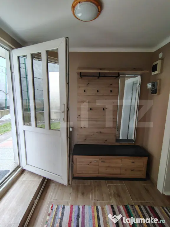 Casă cu 2 unități separate, garaj, terasă și foișor cu - Baciu (Cluj)