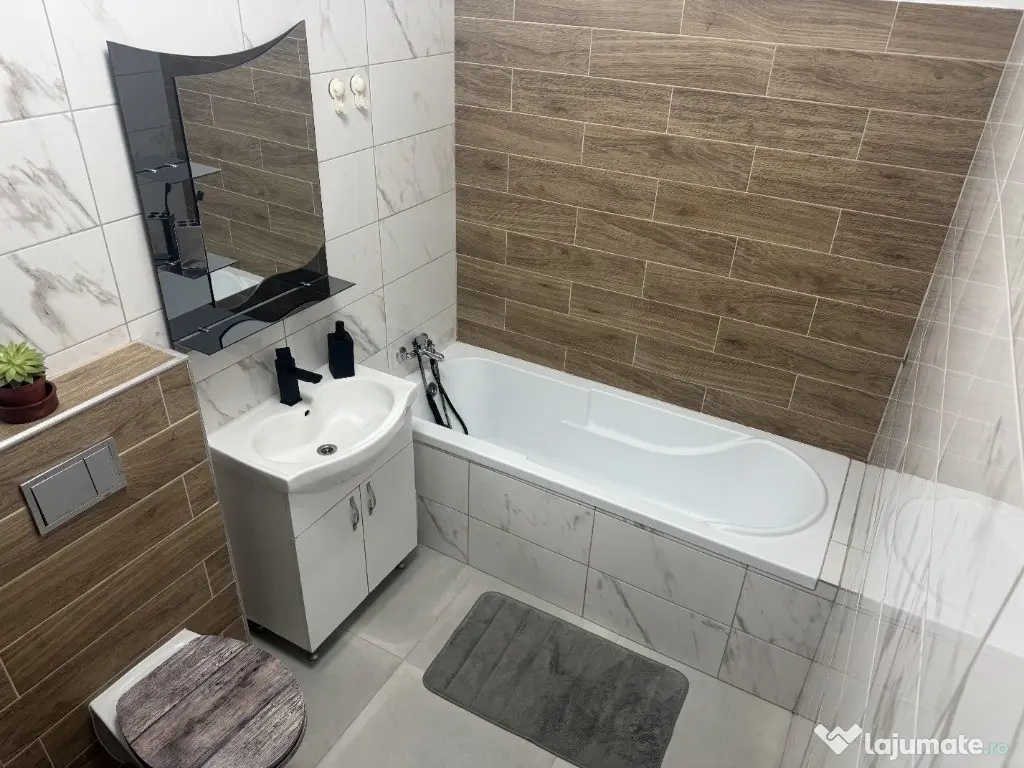 Apartament tip casa curte privata 75mp | 2 camere | parcare central