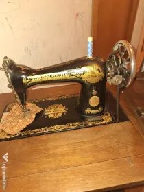 Masina de cusut Singer