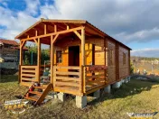 Casuta din lemn,cu 520mp teren intravilan,zona linistita,apr 